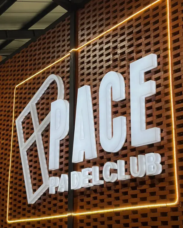 Lit Pace logo on a brick wall