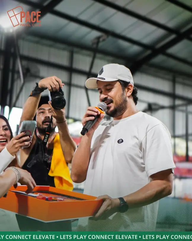 Host on the mic at a Pace event